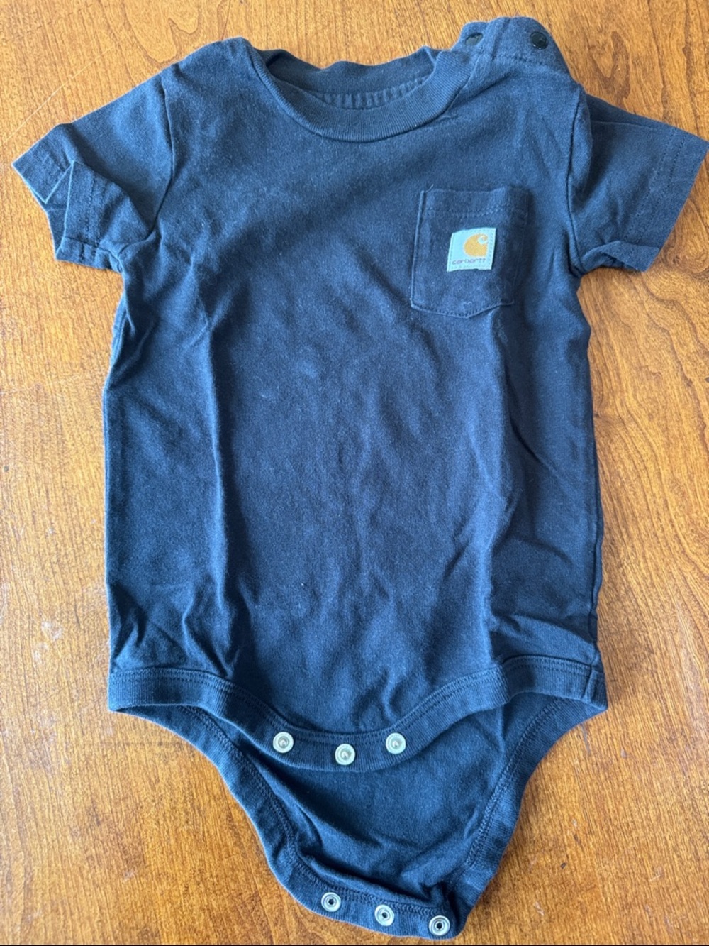 Carhartt black Baby Onesie with Pocket Logo